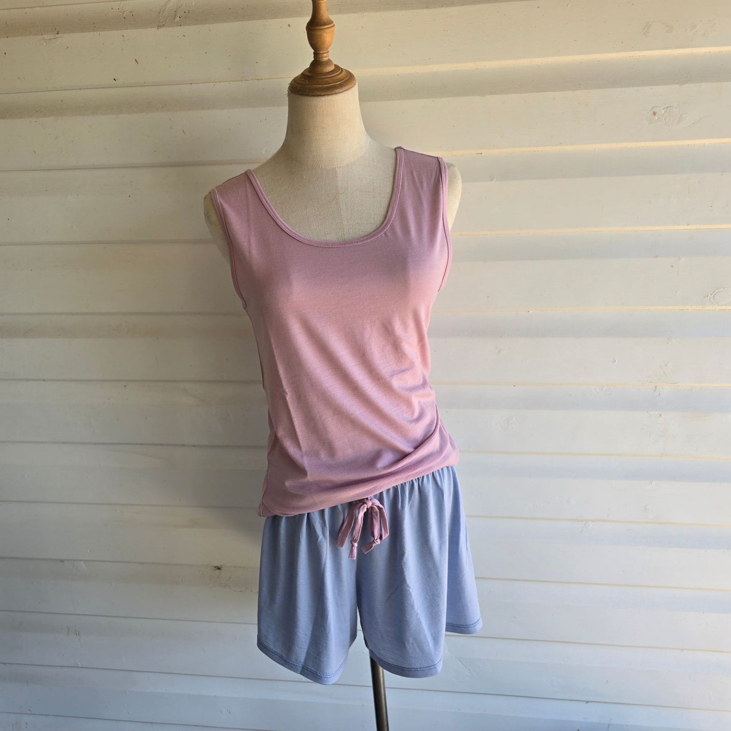 Dusty Pink Merino Singlet on mannequin