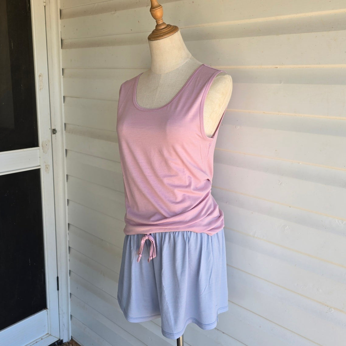 mannequin wearing dusty pink merino singlet 