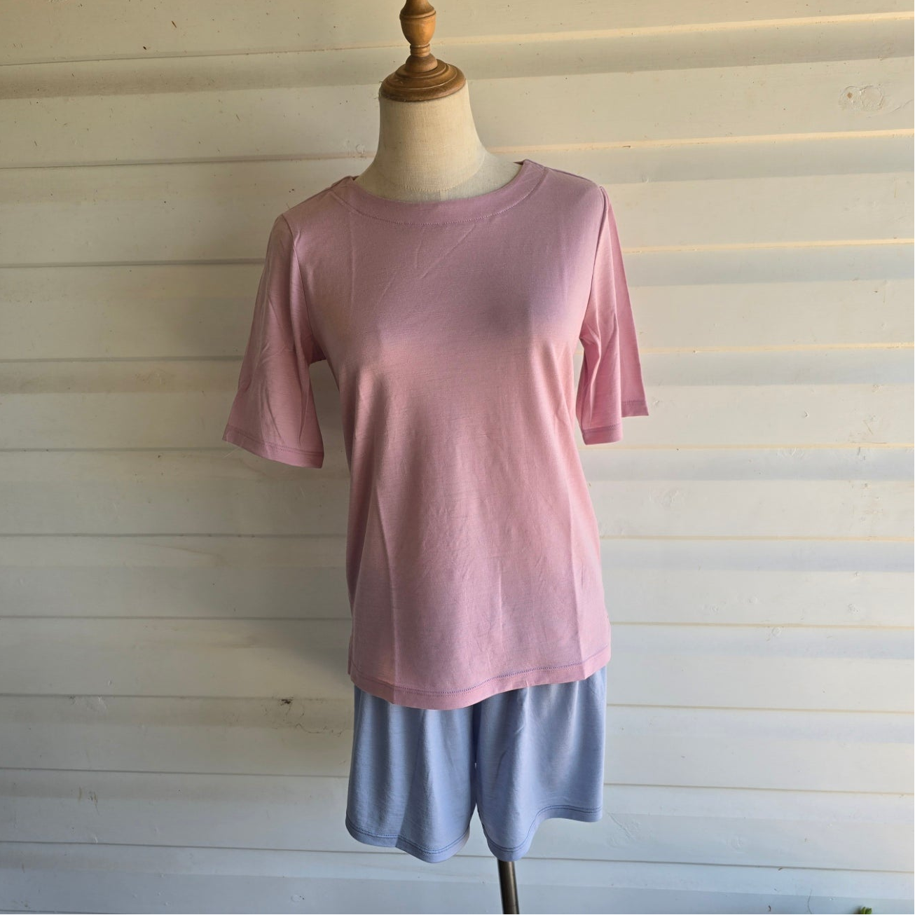 mannequin wearing dusty pink elbow length merino tee